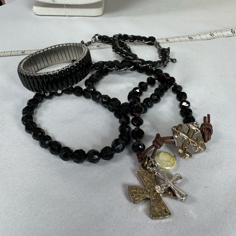 Group of six black bracelets